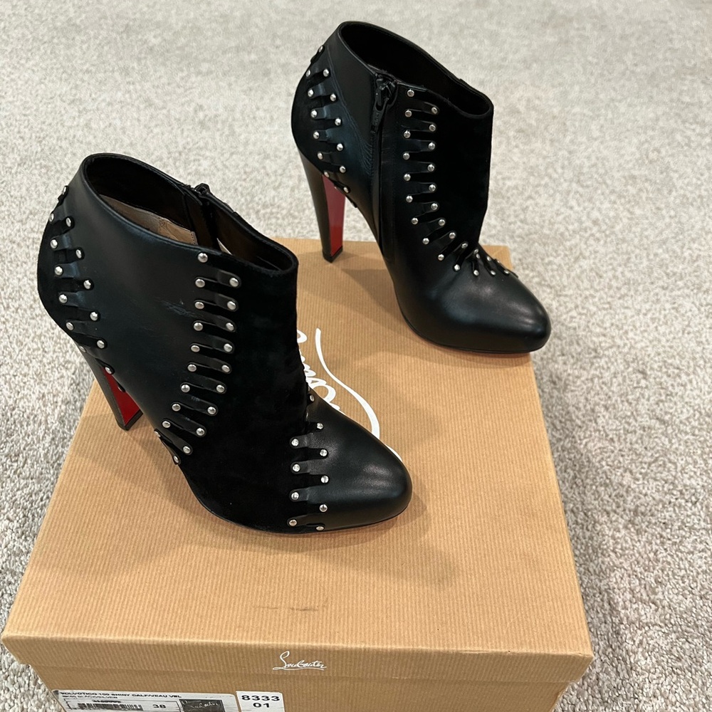 Christian Louboutin booties.